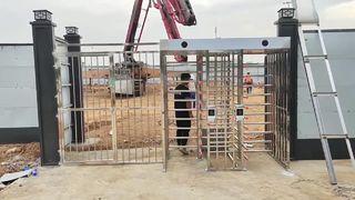 Full-height turnstile installation at construction site | Access via card swiping