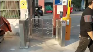 Swing trunstile in Use at Community Entrance
